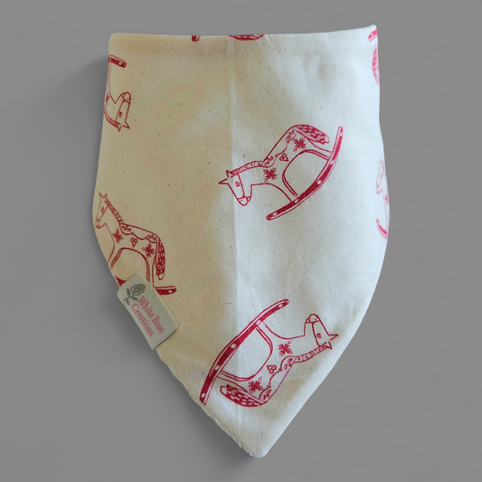 Christmas Bib - Scandi Rocking Horses Red